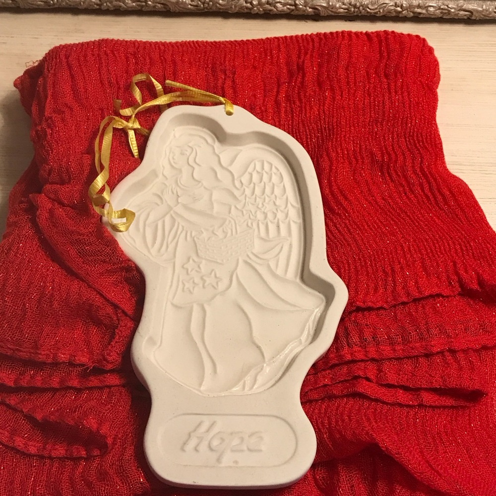 From Longaberger Basket Co. It’s the 1994 collectable HOPE cookie cutter!